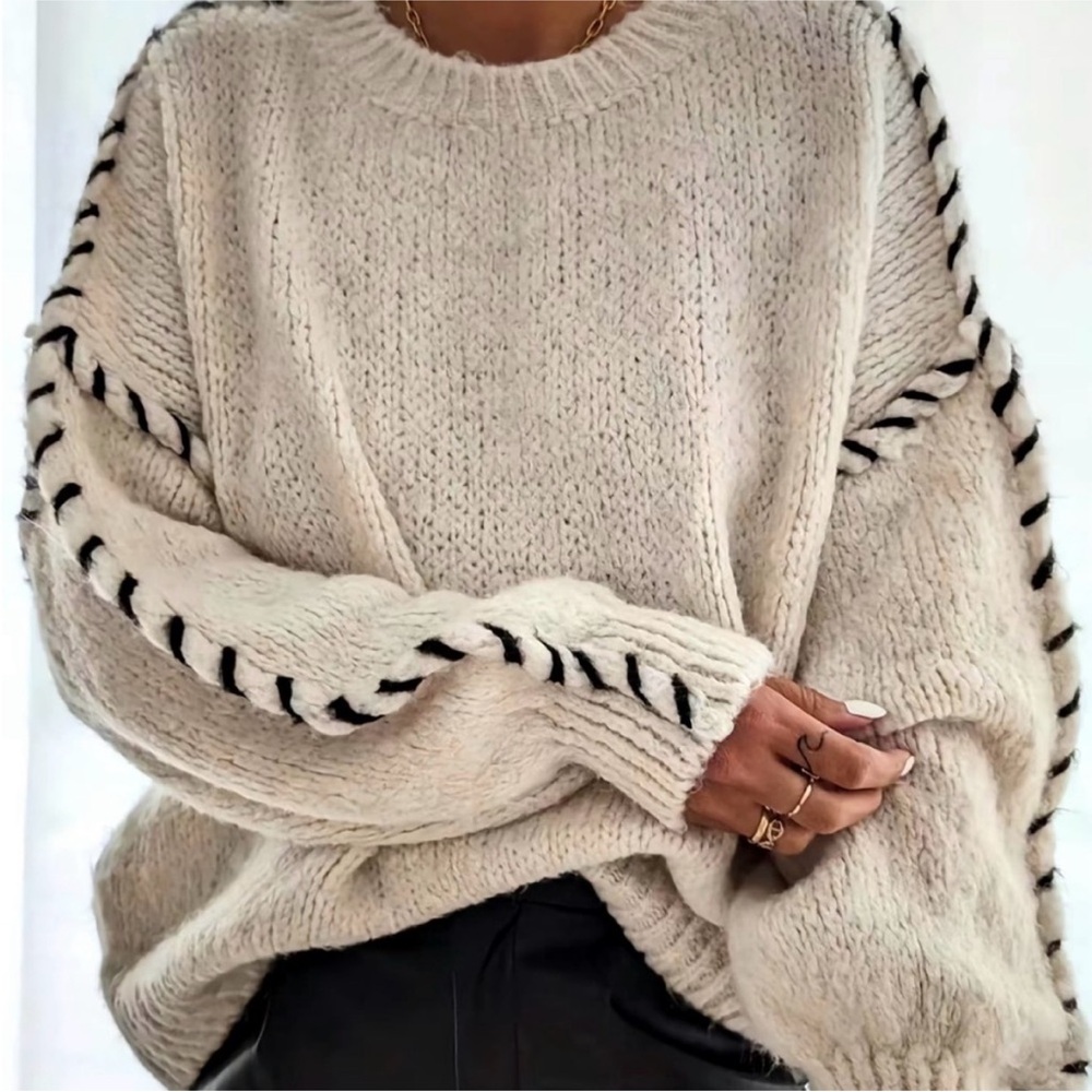 Cozy Cream Sweater with Black Accents